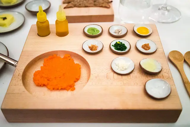 Carrot tartare with rye and assorted condiments at Eleven Madison Park. People pay big bucks for this stuff!